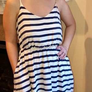Blue and white striped dress with pockets.